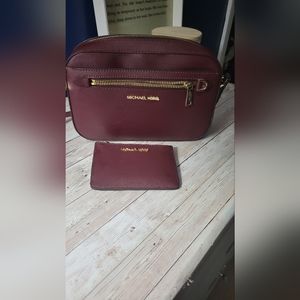 Cute maroon Michael Kors Crossbody with wallet!